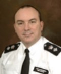 photograph of Commander Mark Benbow